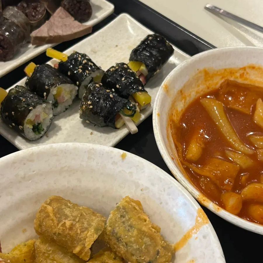 Sampling several snack food items in turn