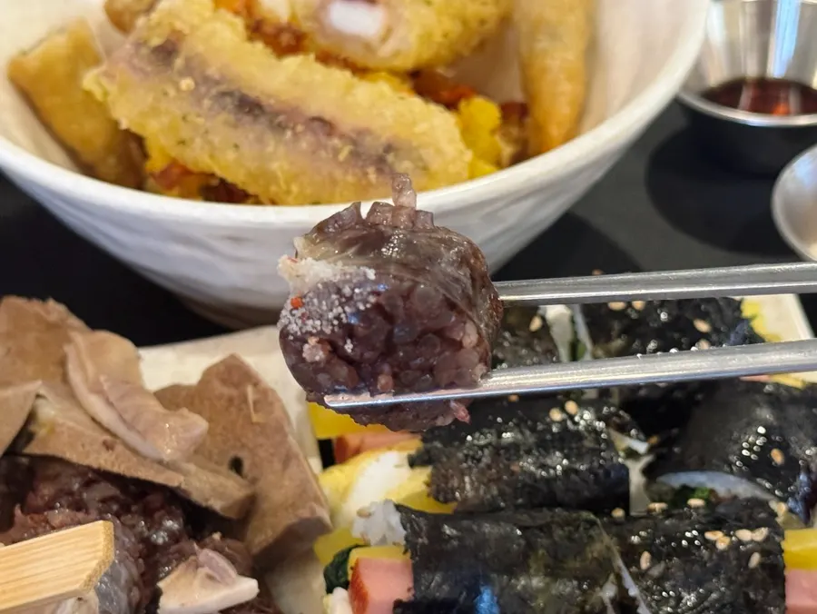 Tteokbokki and sundae placed together on the table