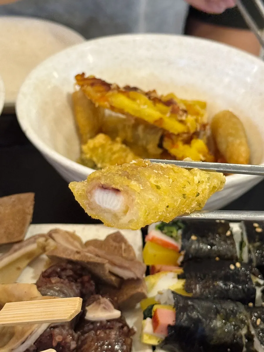Close-up of sweet potato and squid fritters