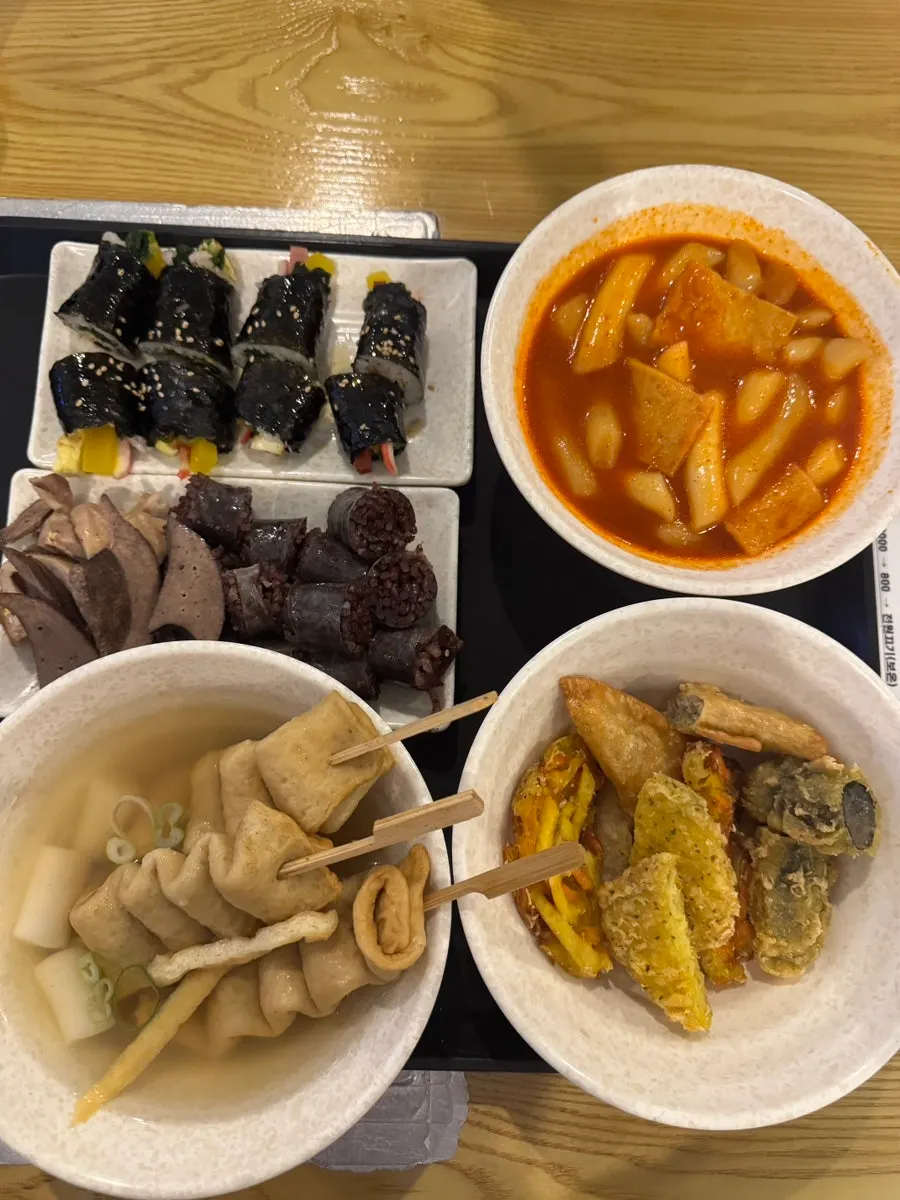 Tteokbokki, fritters and sundae laid out in the combo set