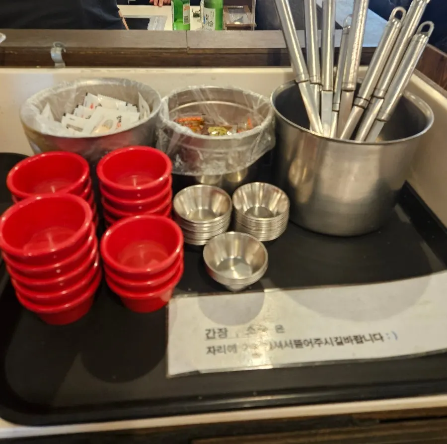 Self-serve bar with pickled radish and fried snacks