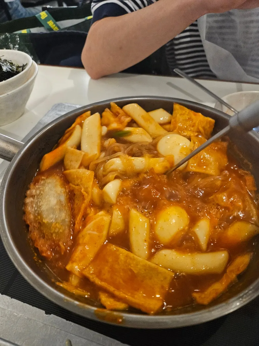 Close-up of soft rice cakes soaked in sauce