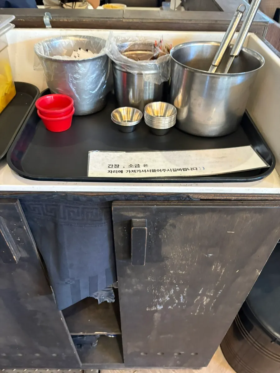 Self-serve bar with fry batter and individually packed soy sauce