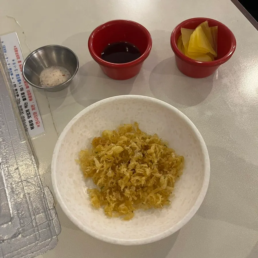 Fritter crumbs and side dishes prepared at the self-bar