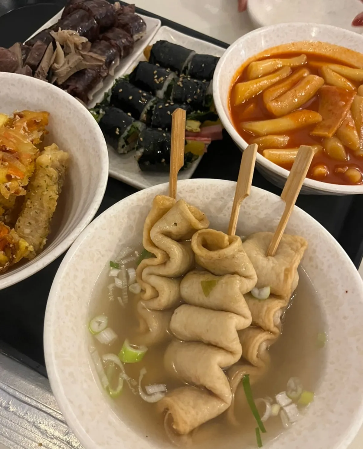 Hyeonseoni combo set with tteokbokki, fritters, sundae, and mini gimbap