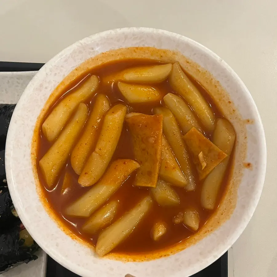 Close-up of sauce-soaked wheat rice cake tteokbokki