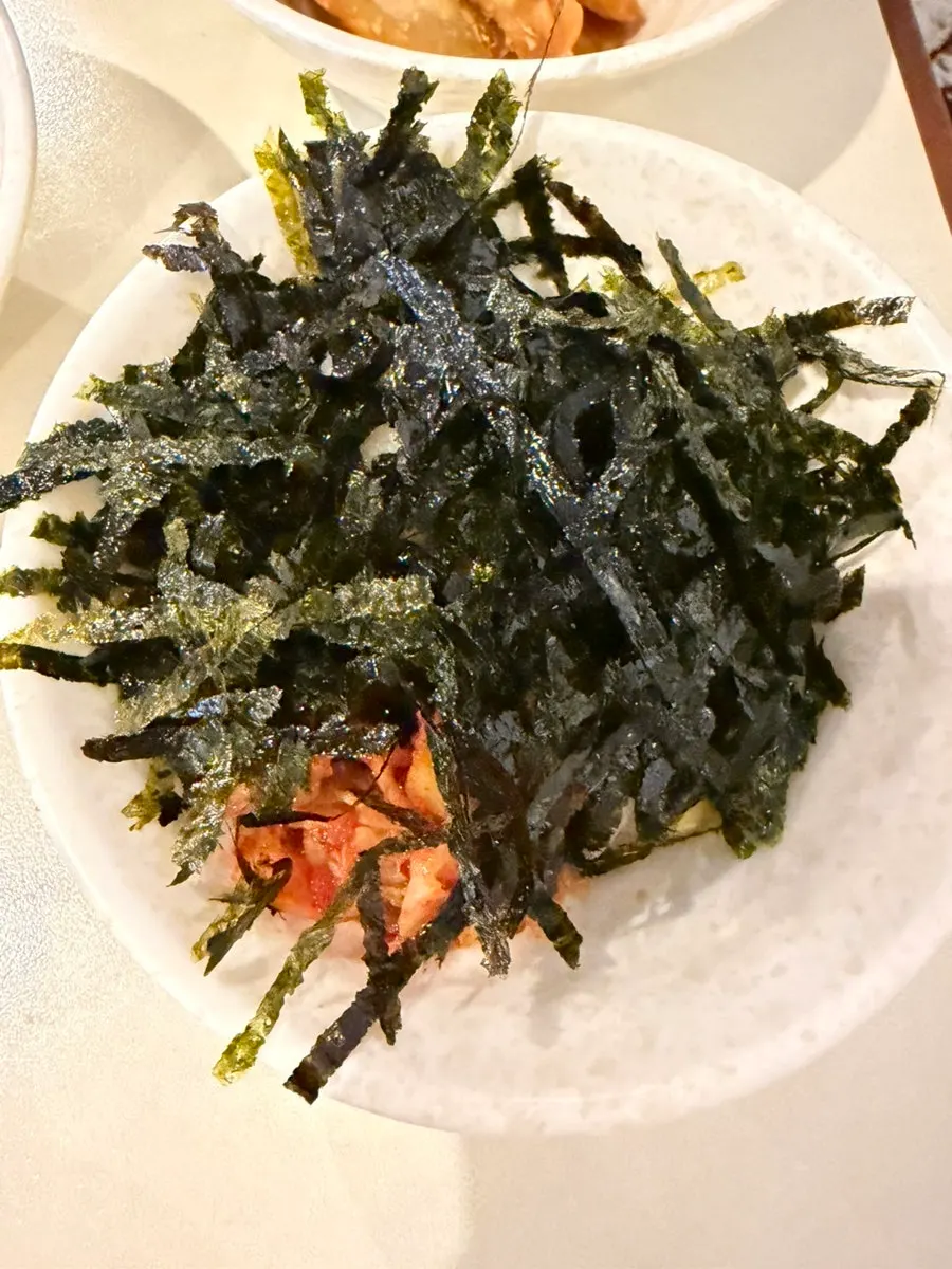 Fried food dipped into tteokbokki broth