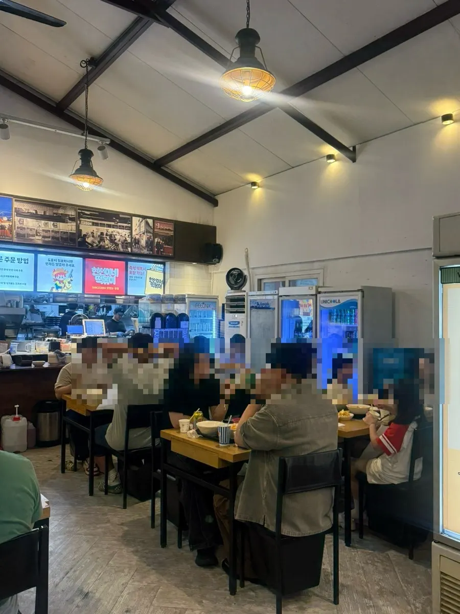 Interior of Hyeonseonine Yongsan Main Branch bustling with customers