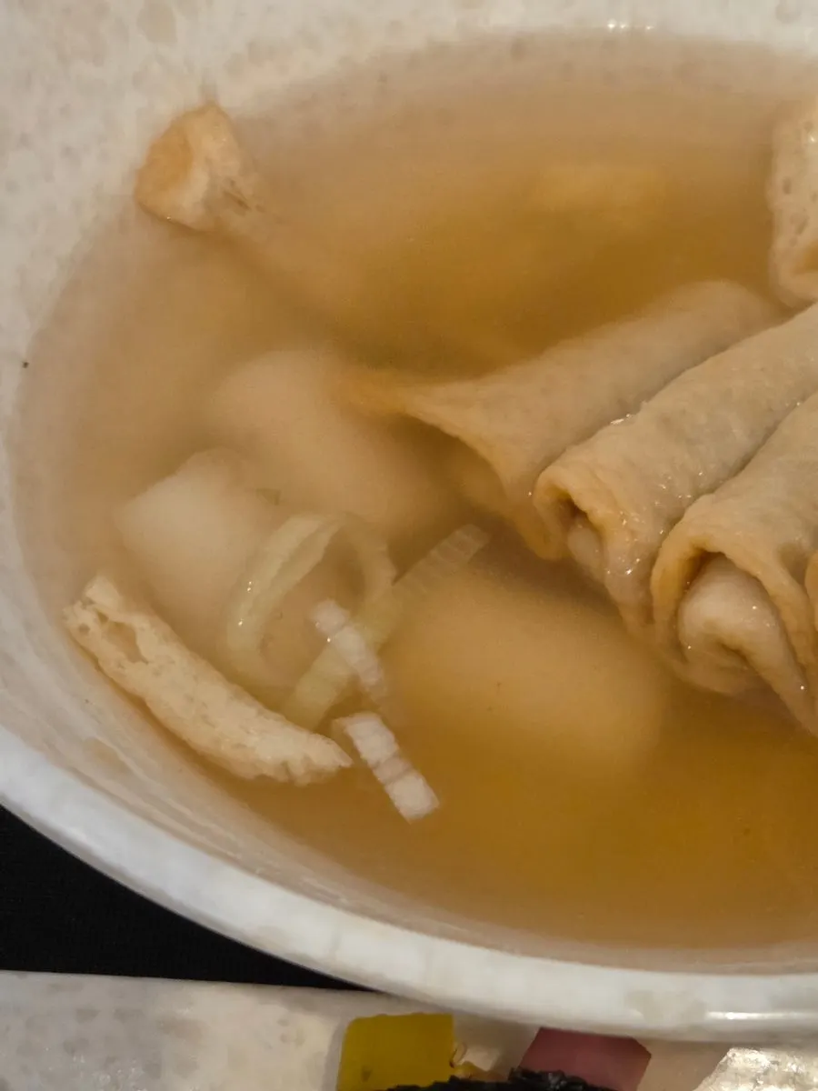 Fish cake broth with fried tofu and rice cake