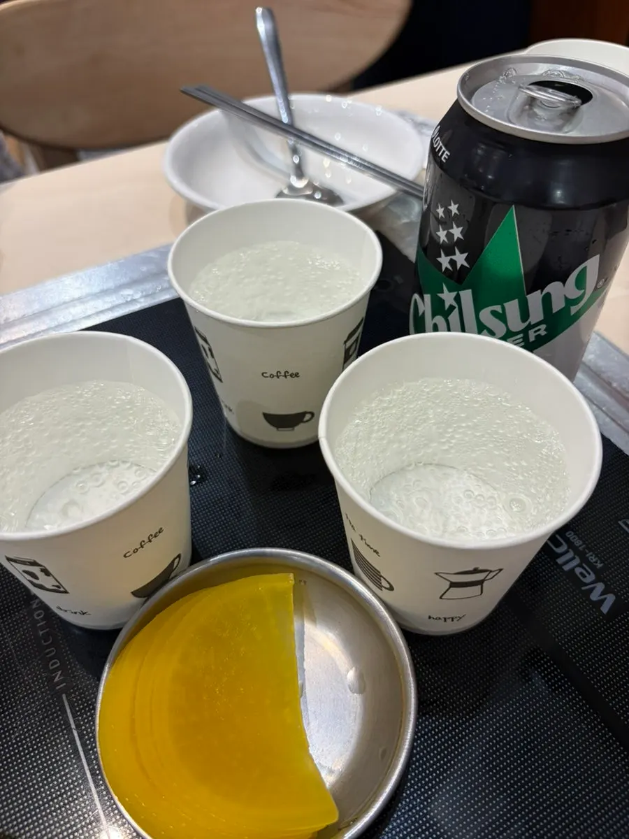Utensils and water at the self-serve bar