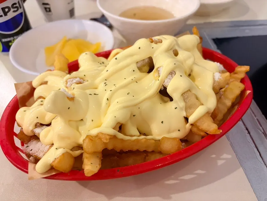 A plate of the new butter garlic fries