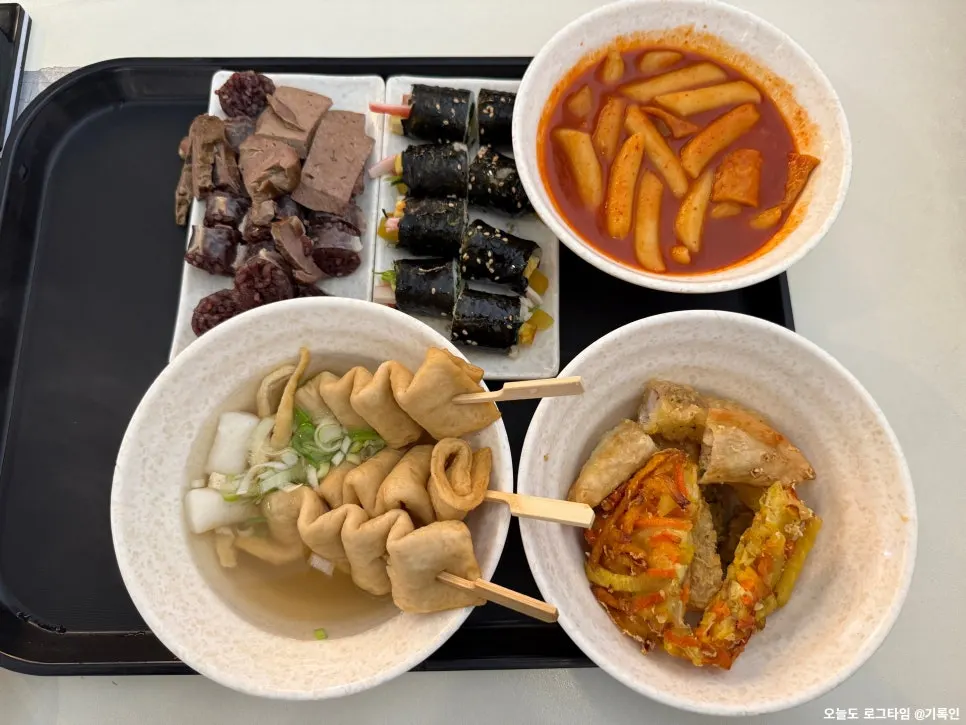 The full Hyeonseon combo set with tteokbokki, sundae, and fritters
