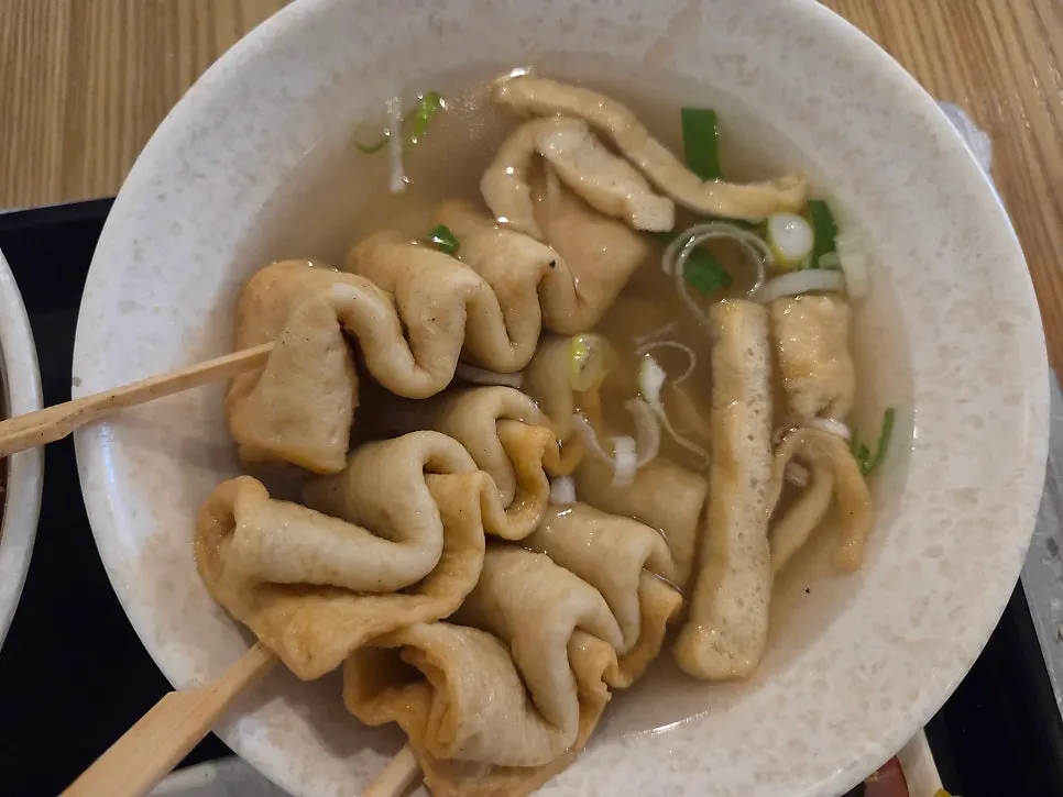 Bunsik spread served alongside draft beer