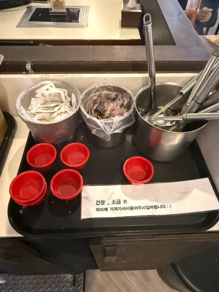 Self-serve bar with danmuji and fried batter flakes
