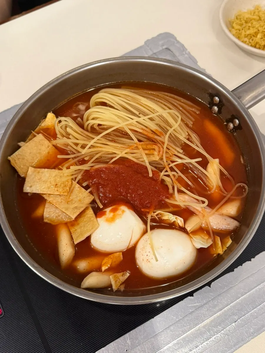 Instant tteokbokki with rice cake, fish cake, egg, and noodles