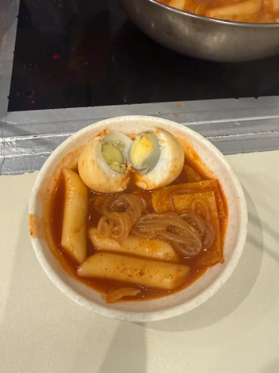 Instant tteokbokki simmered until the broth thickens