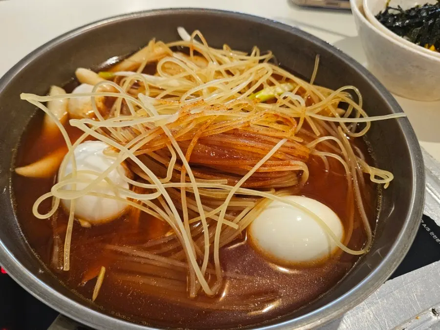 A tray of mild instant tteokbokki before cooking