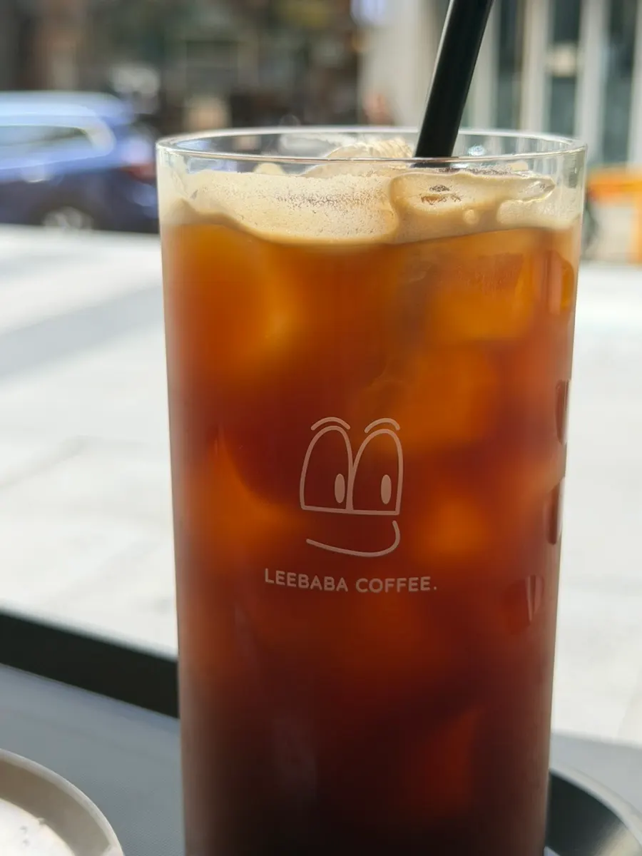 Iced americano, grapefruit lychee ade, and Basque cheesecake