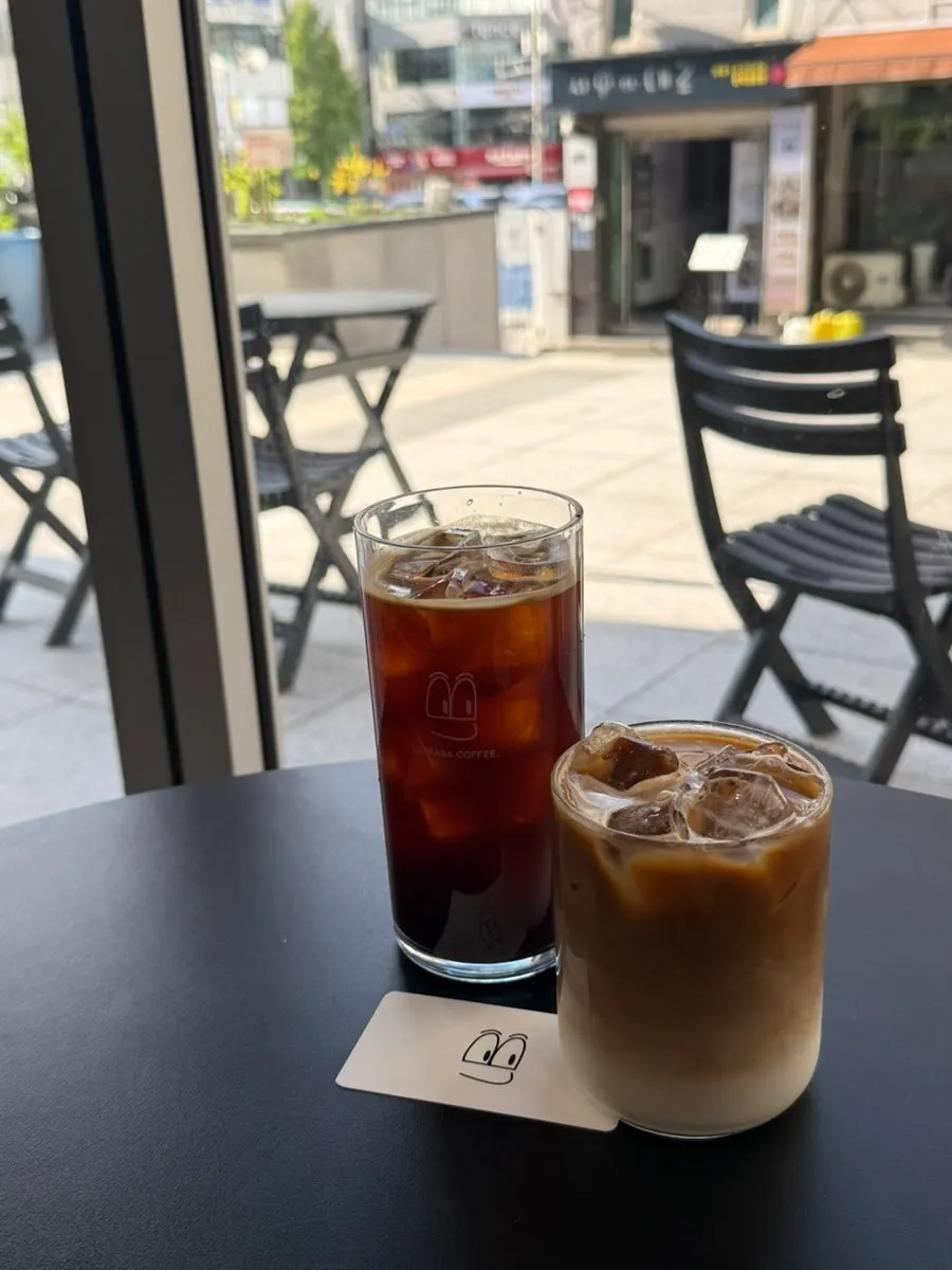 Two iced coffees served at the table
