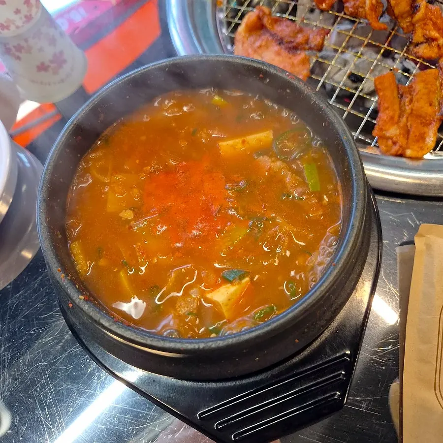 Doenjang stew loaded with ingredients, served as standard