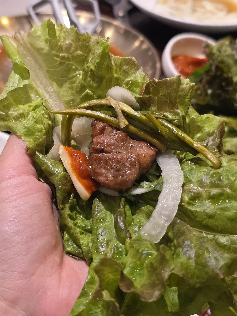 Pork ribs served with lettuce