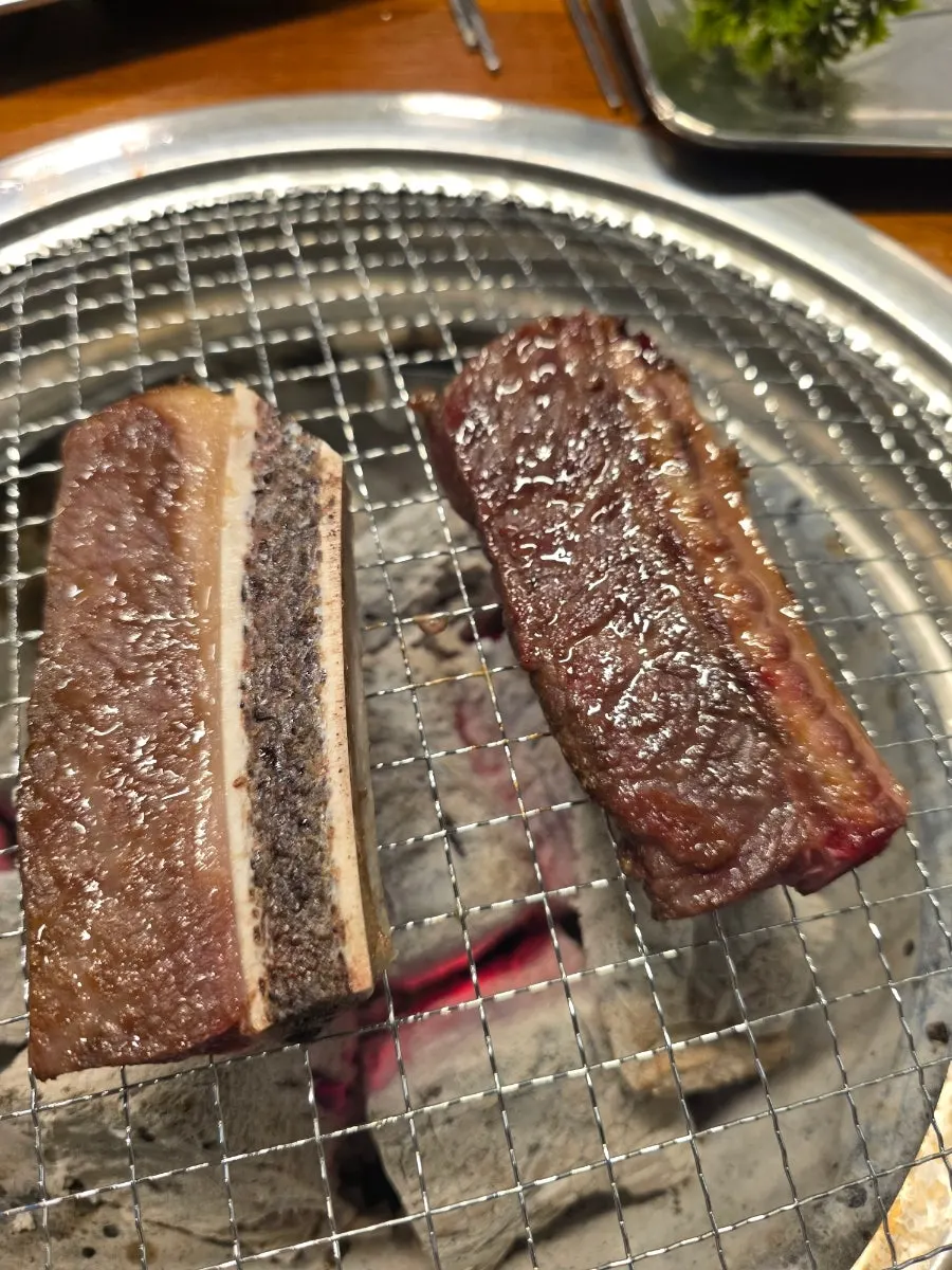 Beef rib meat being grilled