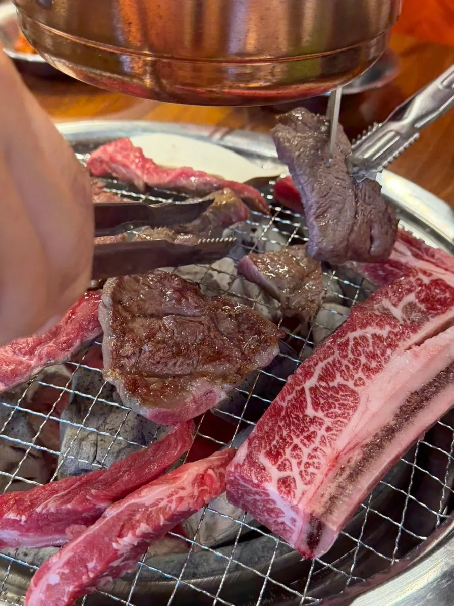 Beef rib meat and fan meat cooking on the grill