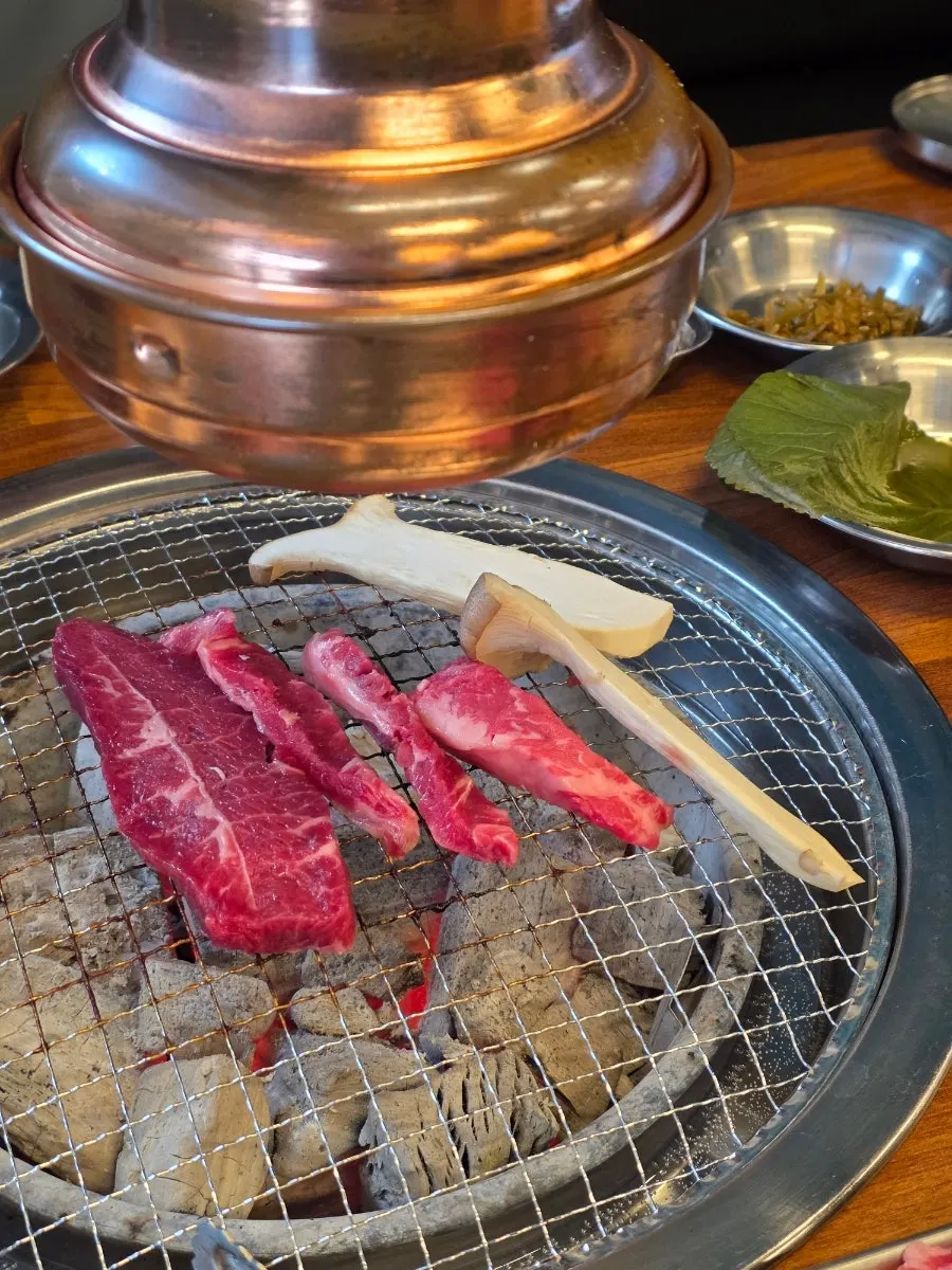 Buchaesal cooking on the grill