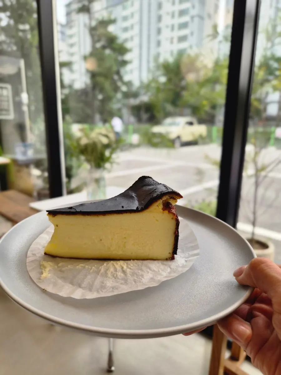 Cross-section of the dense handmade Basque cheesecake