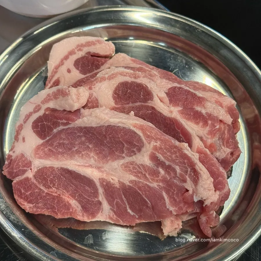 Plate of ordered fresh pork neck 200g, raw