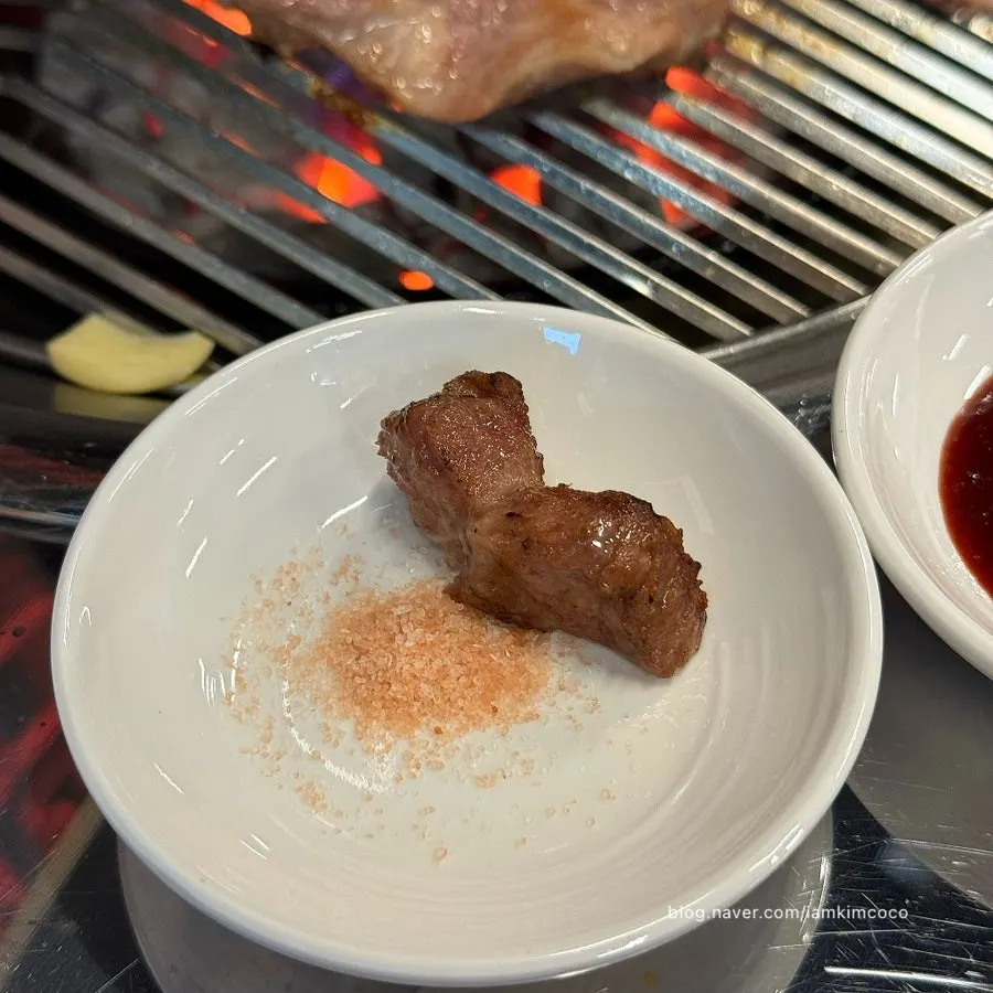 Pork neck dipped in spicy sauce