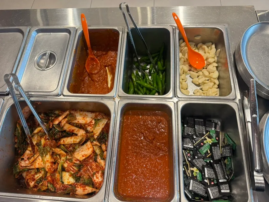 Self-serve wrap-vegetable bar in the middle of the restaurant