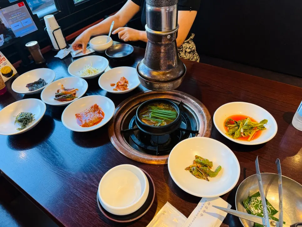 Full table spread of the soy crab and jeyuk ssambap lunch special