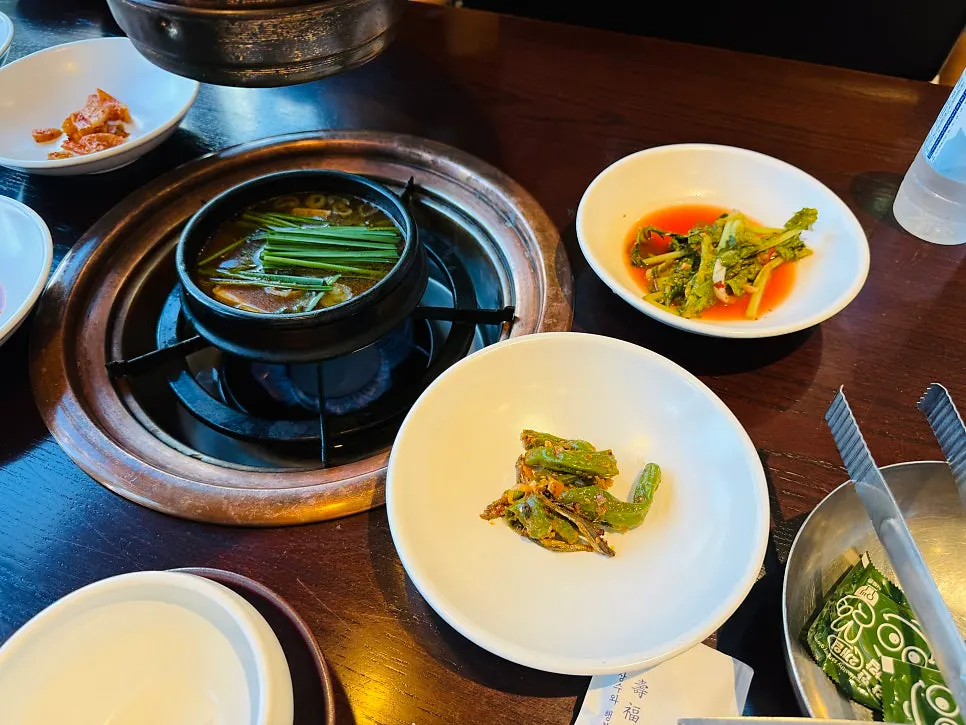 Lunch special table fully filled with dishes
