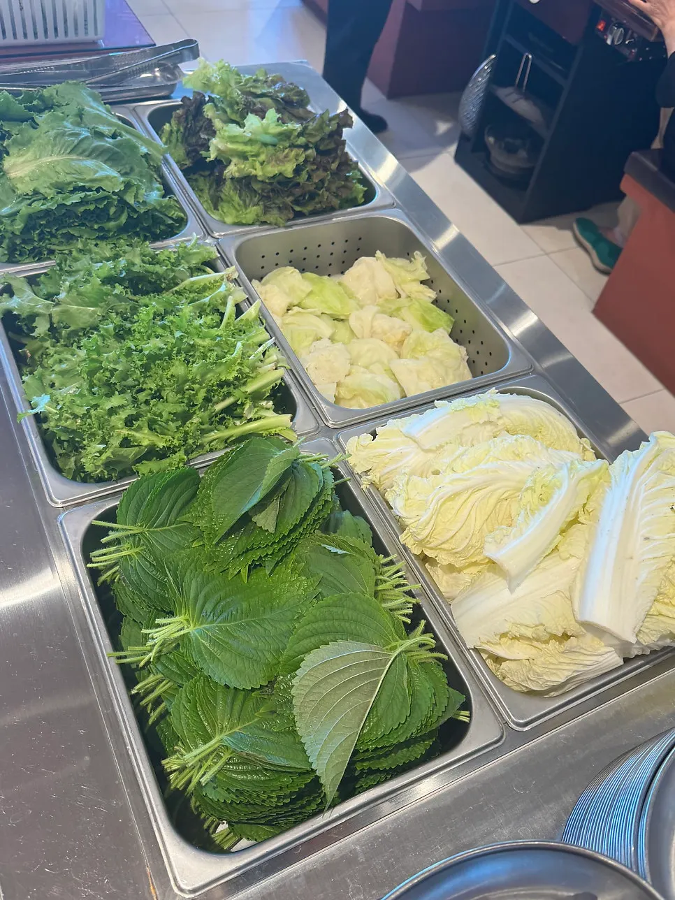 Self-serve bar at Neul Gogi Jip with lettuce wraps, garlic and ssamjang