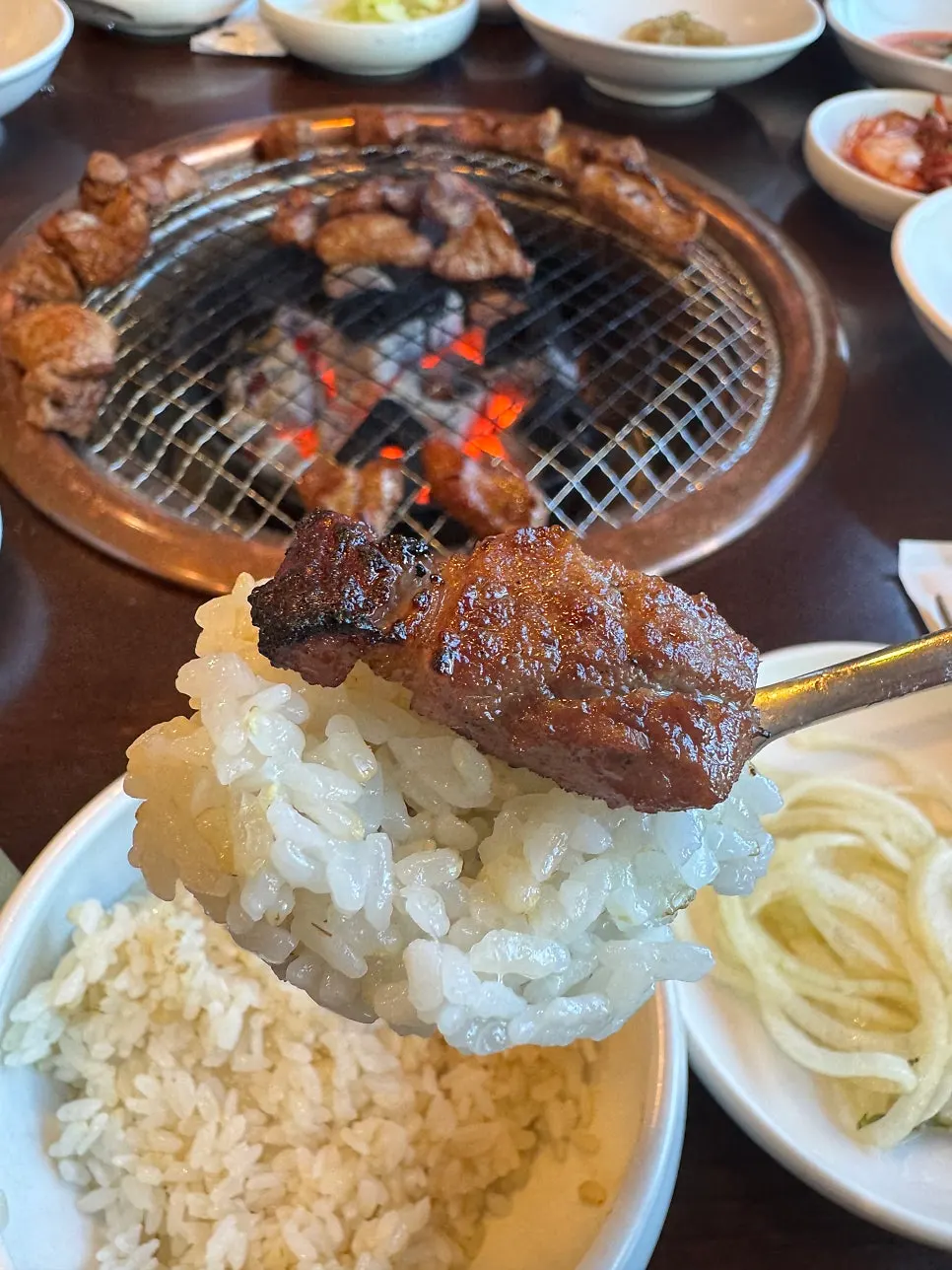 Golden cheese-bomb egg custard alongside grilled pork galbi