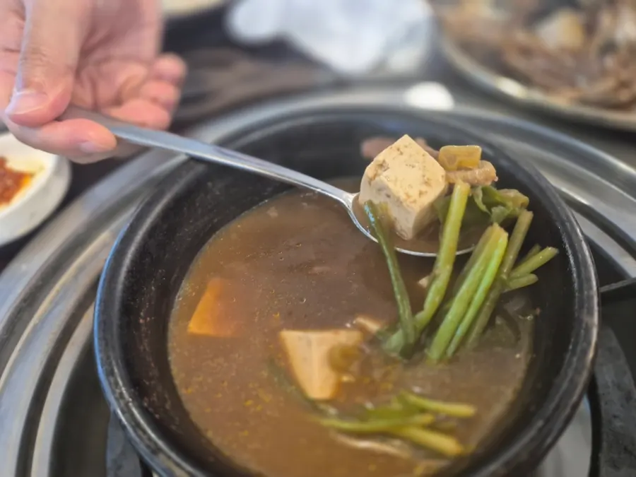 Cheese egg custard puffed up in a stone pot