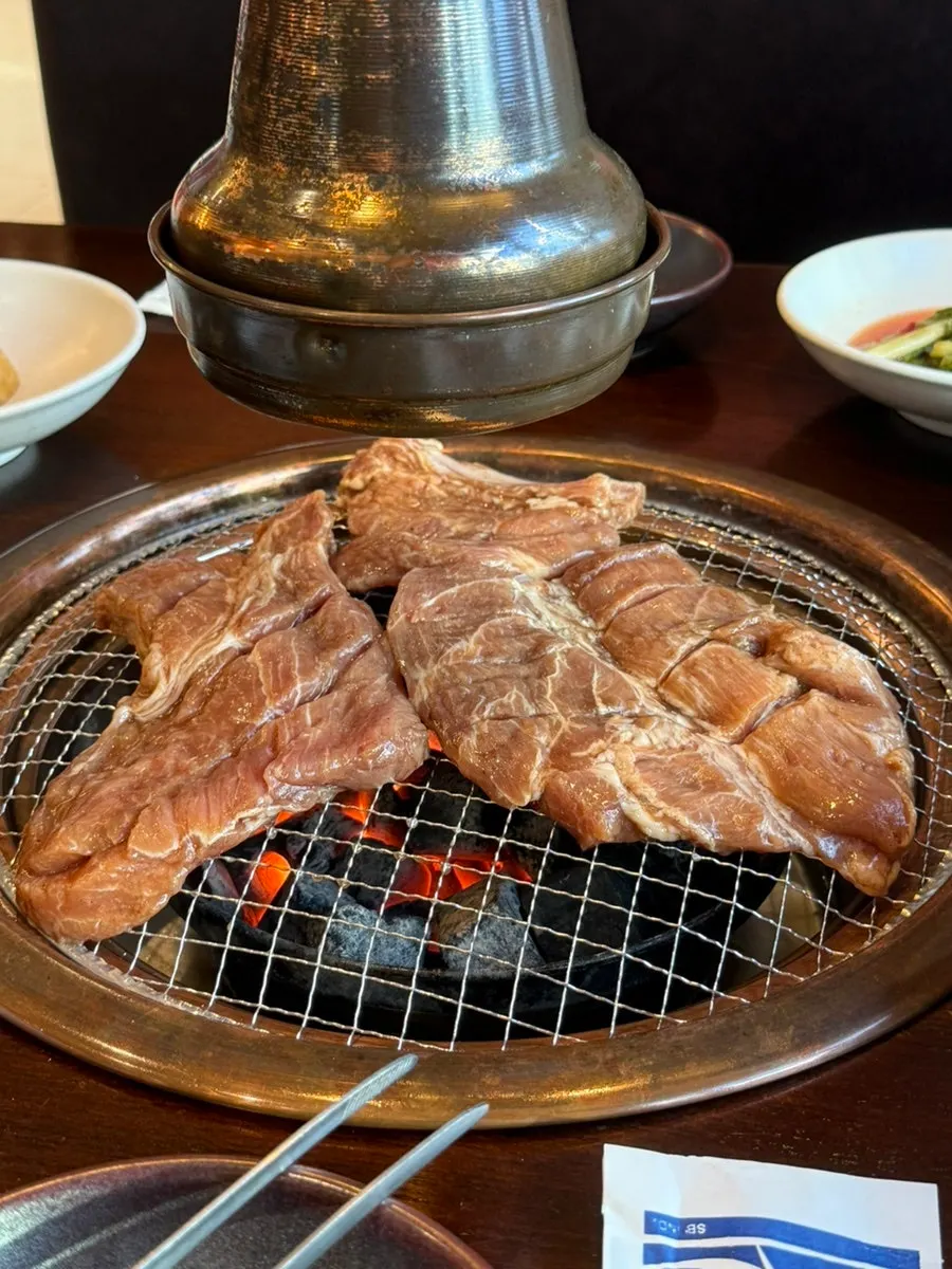Nuruk-marinated pork galbi-mokssal served on a plate