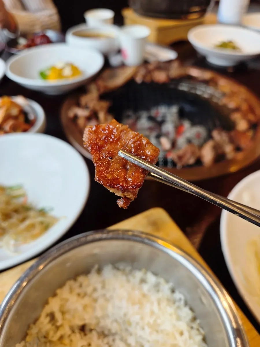Table filled with side dishes and the meal menu