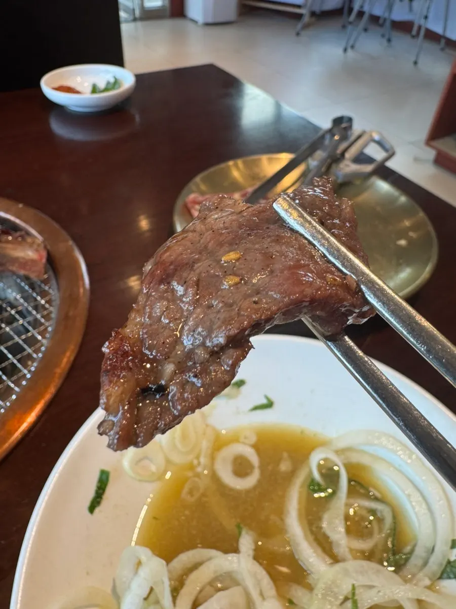 Marinated beef short ribs on the charcoal grill