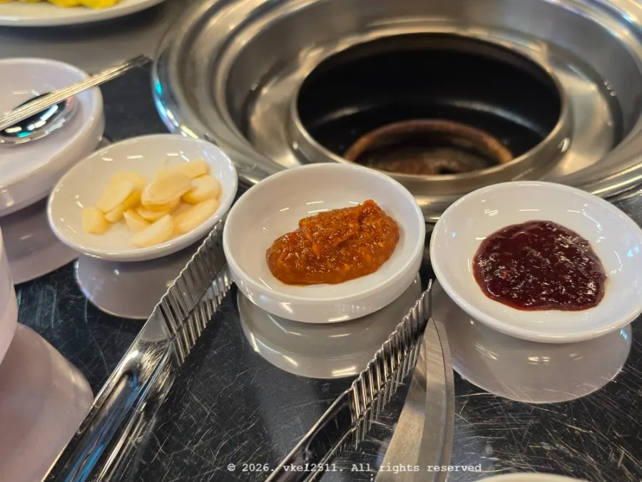 Side dishes with lettuce and shredded scallions