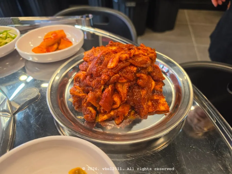 Two servings of marinated red fresh pork belly