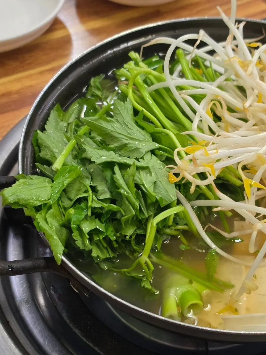 Dongtaetang broth and ingredients starting to boil