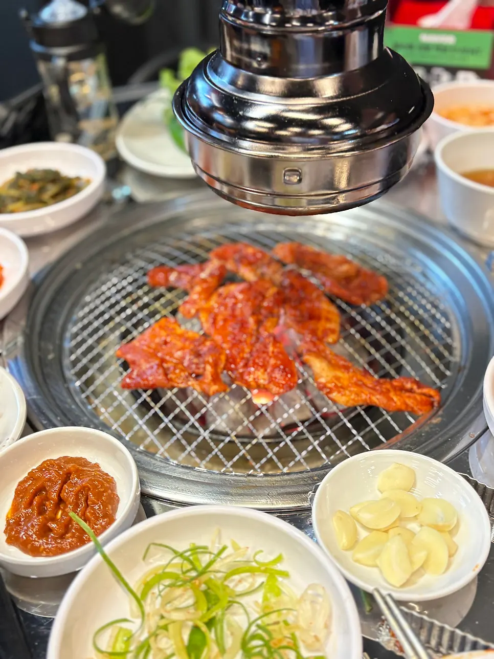 Close-up of the signature spicy raw pork belly