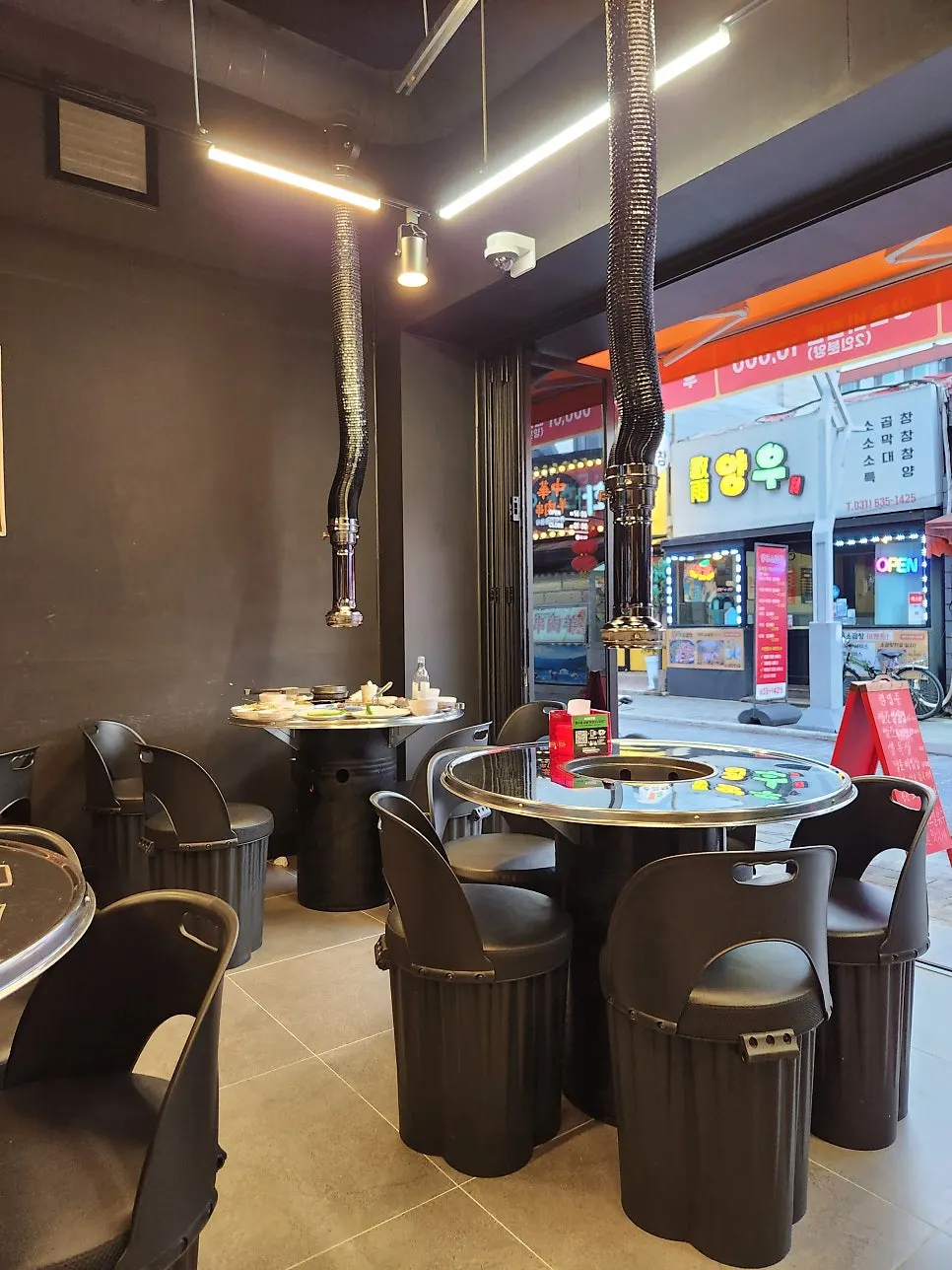 Interior of the BBQ restaurant with round tables