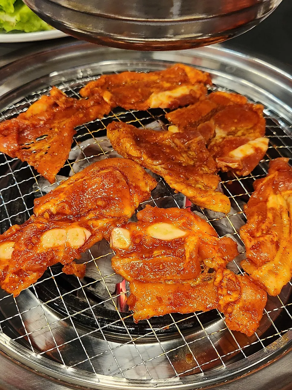 Raw red pork belly with cartilage attached