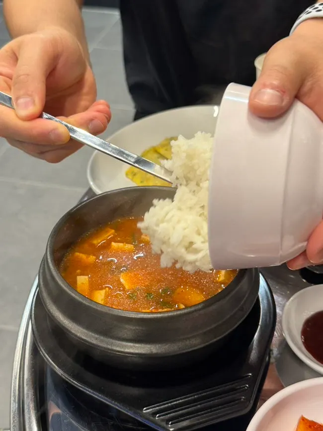 Complimentary soybean paste stew served as an opening treat