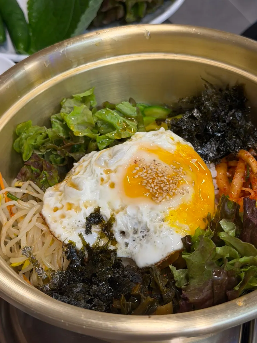 Kimchi jjigae ordered alongside the grilled meat