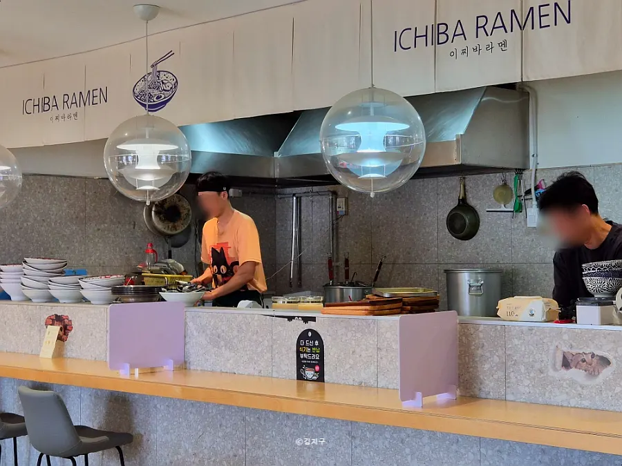 Interior view of Ichiba Ramen near the open kitchen