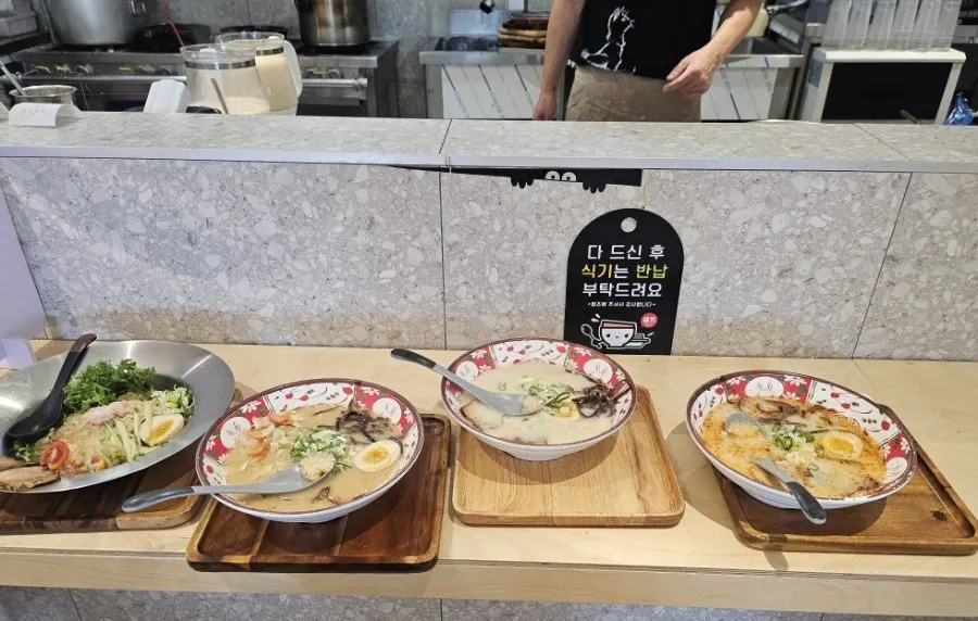 Four bowls of ramen ordered by the family, laid out together